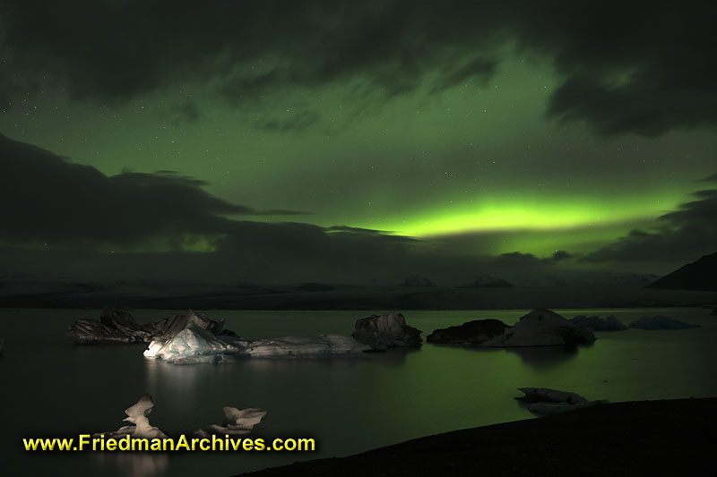 Iceland,iceberg,northern lights,night,time exposure,fill light,green,sky,aurora borealis,